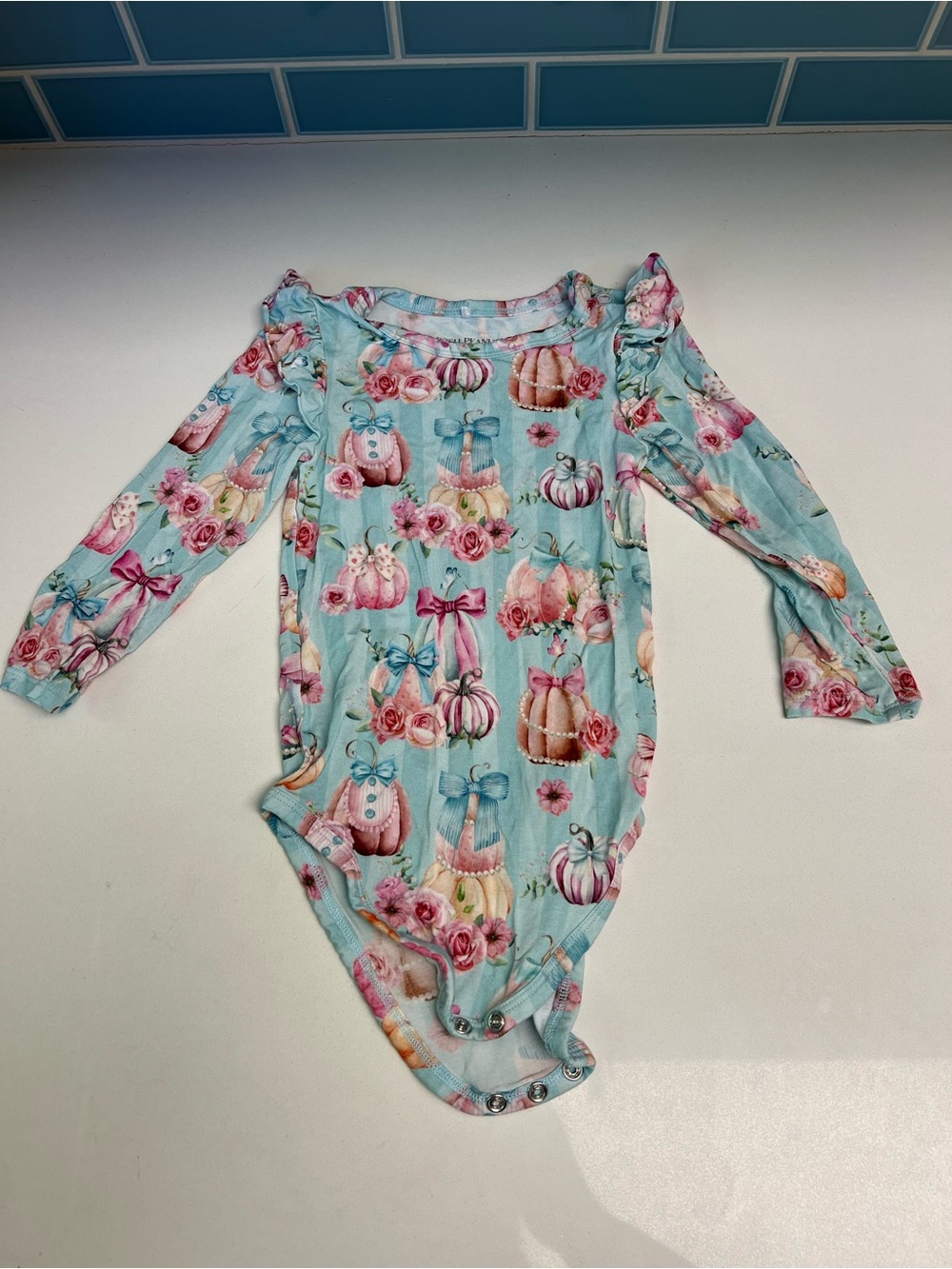 Posh Peanut Light Blue Floral Pumpkin Print One-Piece Bodysuit